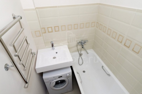 Почему не стоит вешать полотенцесушитель над стиральной машиной