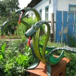 Поделки из покрышек: клумбы, цветники, фигуры, садовая мебель Поделки из покрышек: клумбы, цветники, фигуры, садовая мебель